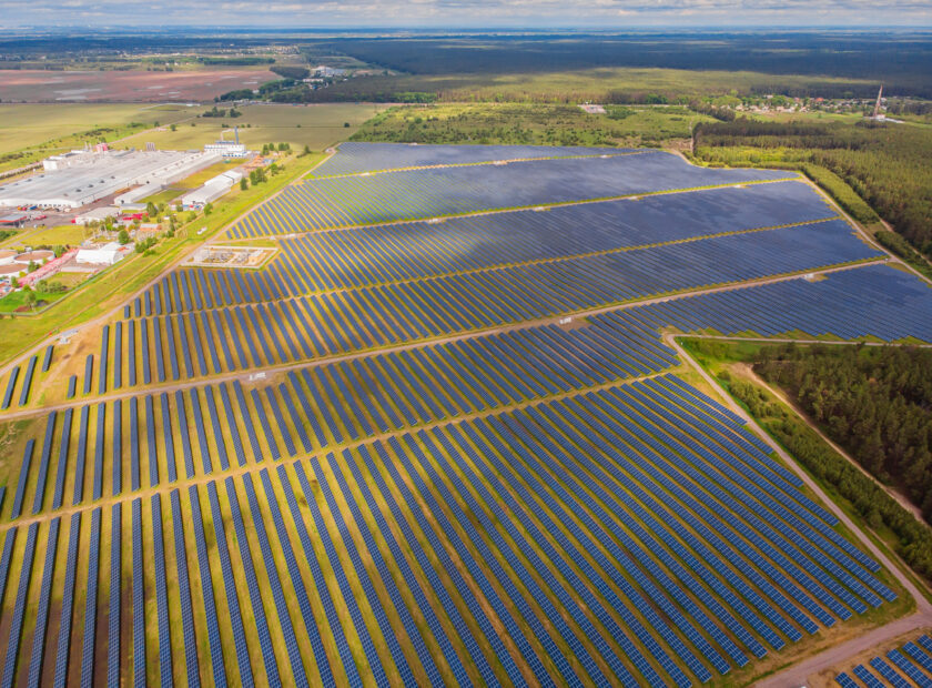 Solar power plant in the field. Aerial view of Solar panels.